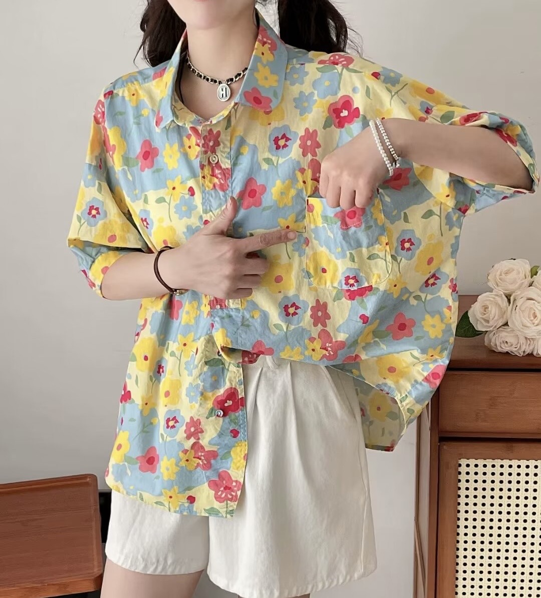 เสื้อผ้าฝ้ายลายดอกไม้แต่งกระเป๋า