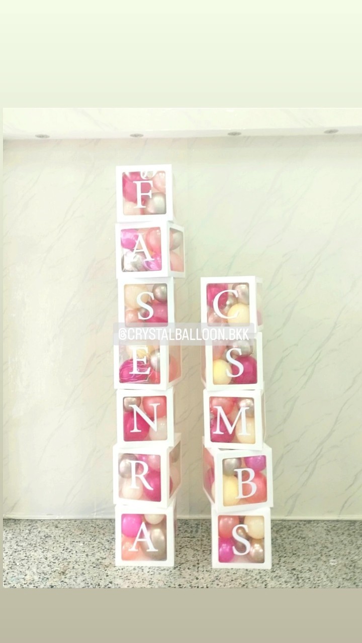 ลูกโป่ง เปิดงาน กล่องใส ขนาด 12" ติดตัวอักษร 12 กล่อง Theme สีชมพู พร้อมตกแต่ง สามารถเปลี่ยนสีลูกโป่ง/เปลี่ยนข้อความได้