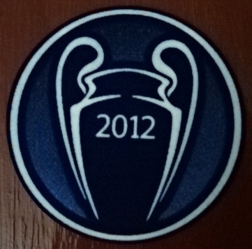 อาร์มสัญลักษณ์ฟุตบอล การแข่งขันฟุตบอลยูฟ่า แชมป์เปี้ยนส์ ลีก - UCL CHAMPIONS 2011/12 PLAYER SIZE ใหม่ / UEFA CHAMPIONS LEAGUE International Football Club Tournament PLAYER SIZE Football Patch/Badge - UCL CHAMPIONS 2011/12 NEW