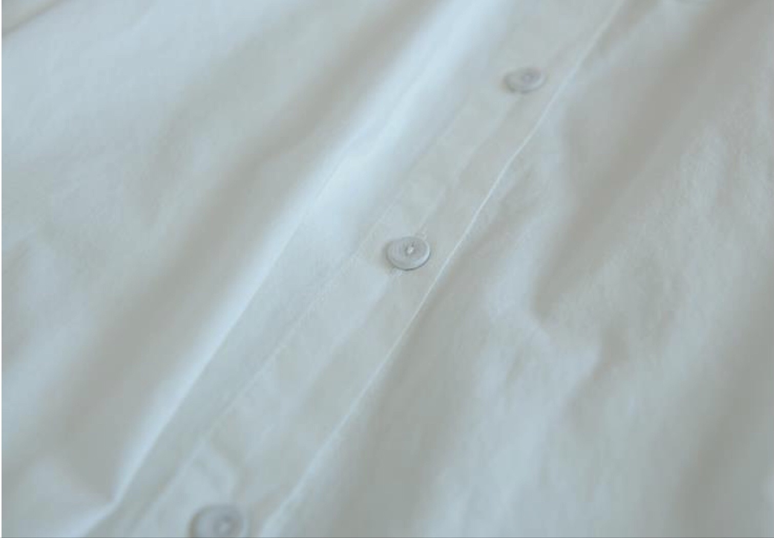 เสื้อผ้าฝายแต่งปกลายปัก
