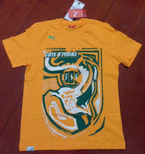 เสื้อที-เชิ๊ต (เสื้อยืดคอกลม) ฟุตบอล ทีมชาติโกตดิวัวร์ (ไอวอรี่ โคสต์) ชุดที่ระลึก ฟุตบอลโลก 2010 ใหม่ M-Size / COTE D'IVOIRE (IVORY COAST) Football T-Shirt Souvenir Kit World Cup 2010 Jersey NEW M-Size