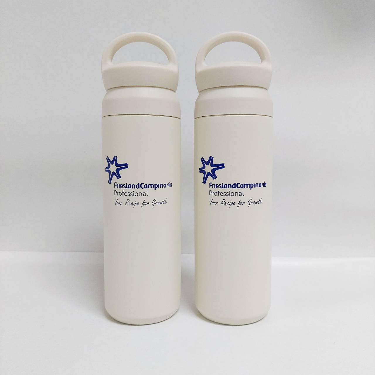 สกรีนโลโก้กระบอกน้ำ friesland campina