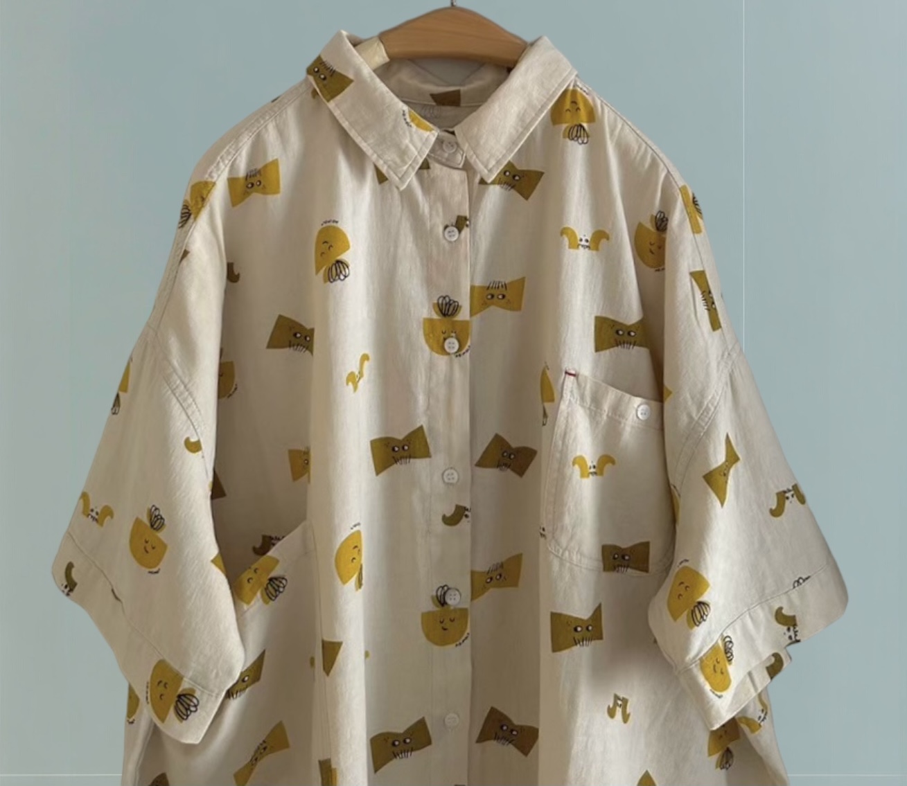 เสื้อผ้าฝ้ายลายพิมพ์แต่งกระเป๋า