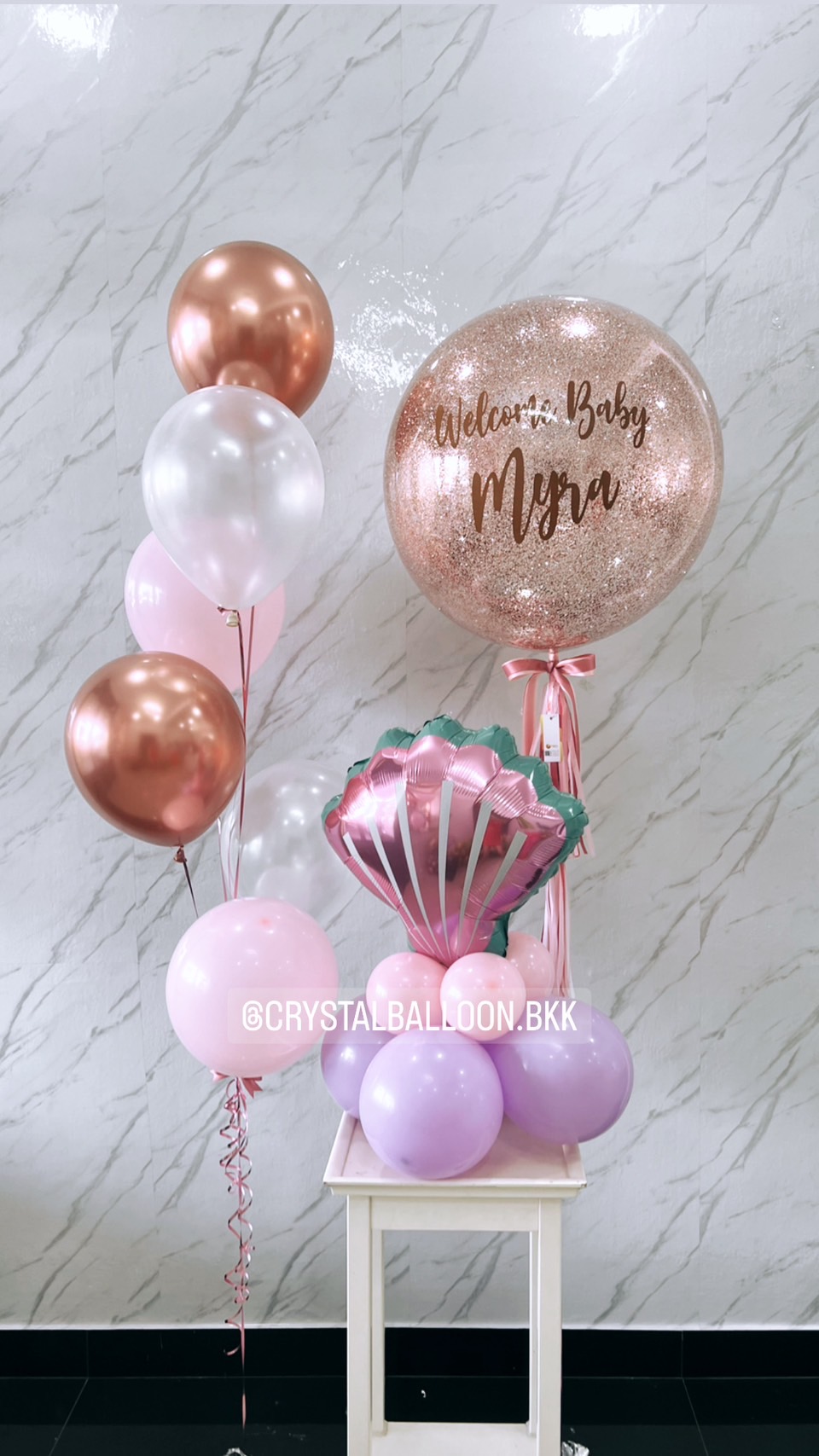 ลูกโป่ง Welcome Baby Bubble ขนาด 24" สีโรสโกล พร้อม ช่อลูกโป่ง 6 ลูก 1 ช่อ พร้อมตกแต่ง ฟอยล์หอย ตั้งฐาน 1 ชิ้น สามารถเปลี่ยนสีลูกโป่ง/เปลี่ยนข้อความ/เปลี่ยนขนาดได้
