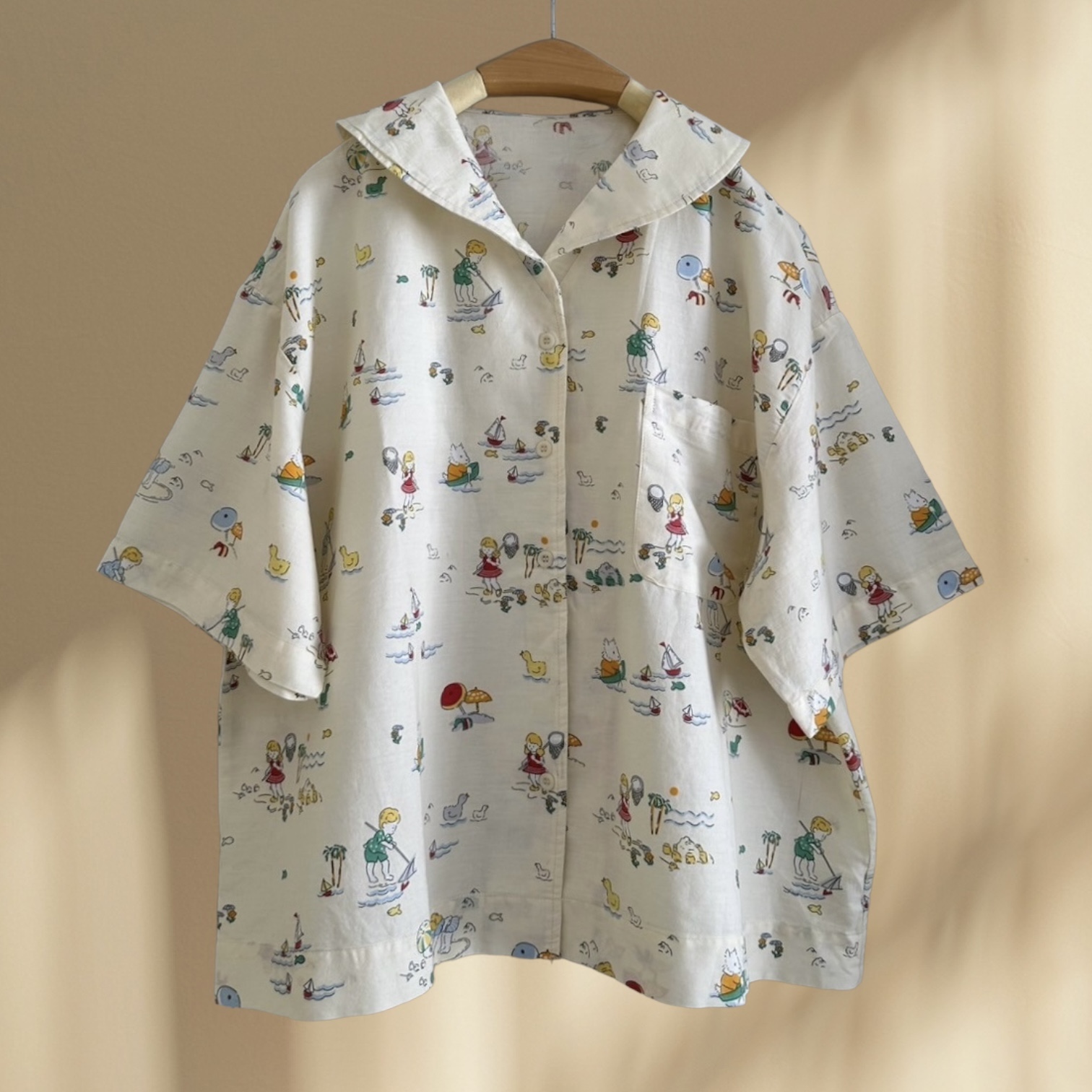 เสื้อคอวีผ้าฝ้ายลายพิมพ์น่ารักๆแต่งกระเป๋า