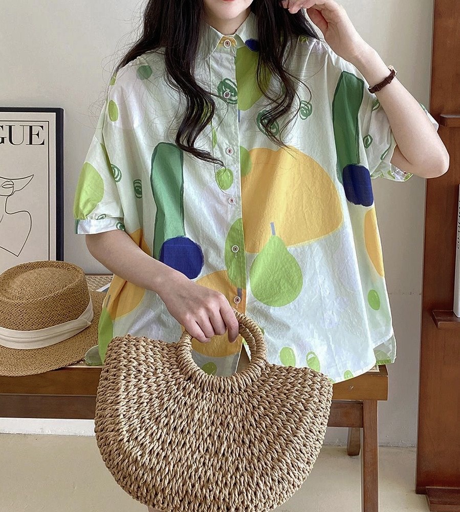 เสื้อผ้าฝ้ายพิมพ์ลายสีสดใส