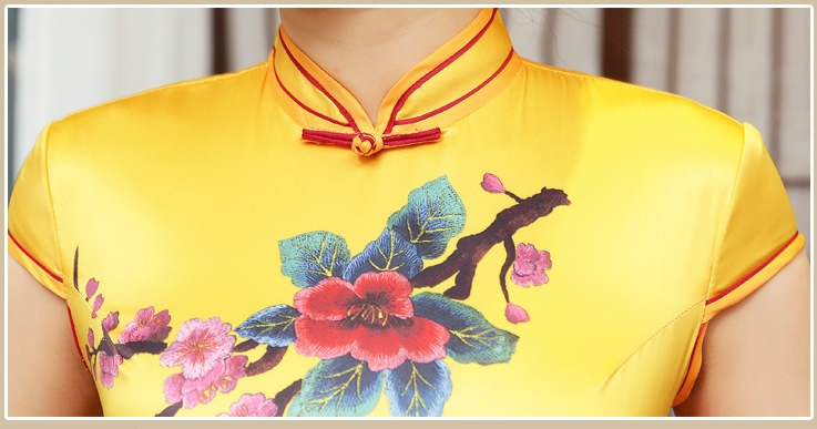 Pre-order กี่เพ้า สีเหลือง ลายดอกไม้ ผ่าข้าง กุ๊นขอบอย่างดี