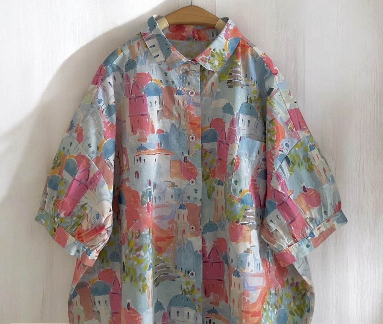 เสื้อผ้าฝ้ายลายพิมพ์แต่งกระเป๋า