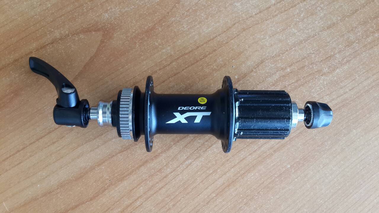 ดุมดิส SHIMANO XT ดุมดิสหลัง ดุมเสือภูเขา XT FH-M785, 8/9/10-Speed, 32H, 36H สีดำ หรือสีเงิน (Malay) Centerlock