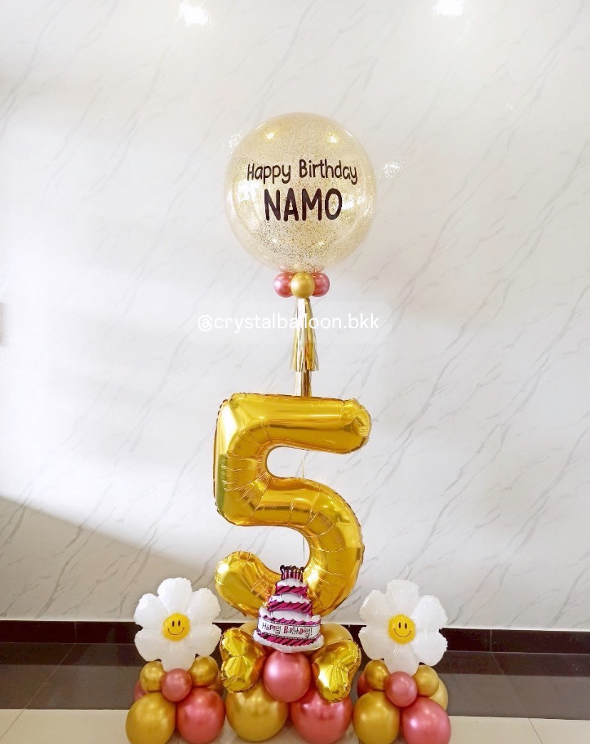 ลูกโป่ง วันเกิด Bubble ขนาด 24" สีกลิตเตอร์ทอง พร้อม ฟอยล์ตัวเลข ขนาด 40" สีทอง ตั้งฐาน 1 ชิ้น ฟอยล์ดอกเดซี่จิ๋ว ตั้งฐาน 2 ชิ้น Theme ชมพู - ทอง พร้อมตกแต่ง สามารถเปลี่ยนสีลูกโป่ง/เปลี่ยนข้อความ/เปลี่ยนขนาดไ