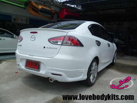 ชุดแต่ง MAZDA 2 SEDAN V.6 : 2011-2014 / 4 ประตู