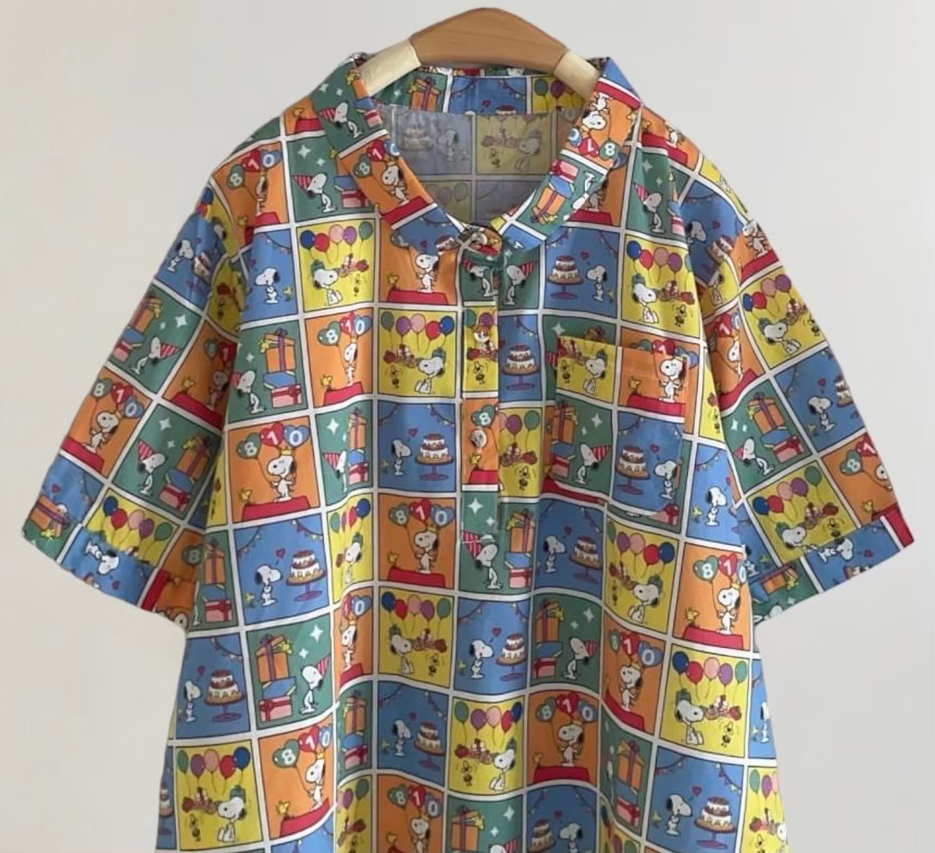 เสื้อผ้าฝ้ายลายพิมพ์แต่งกระเป๋า