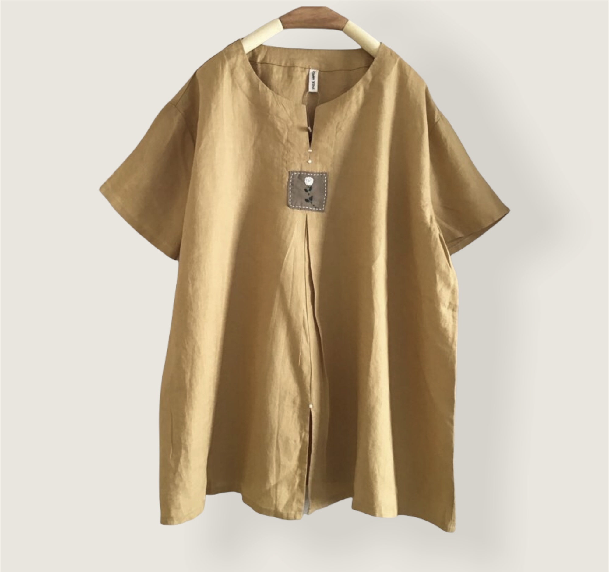เสื้อผ้าลินินปักลาย
