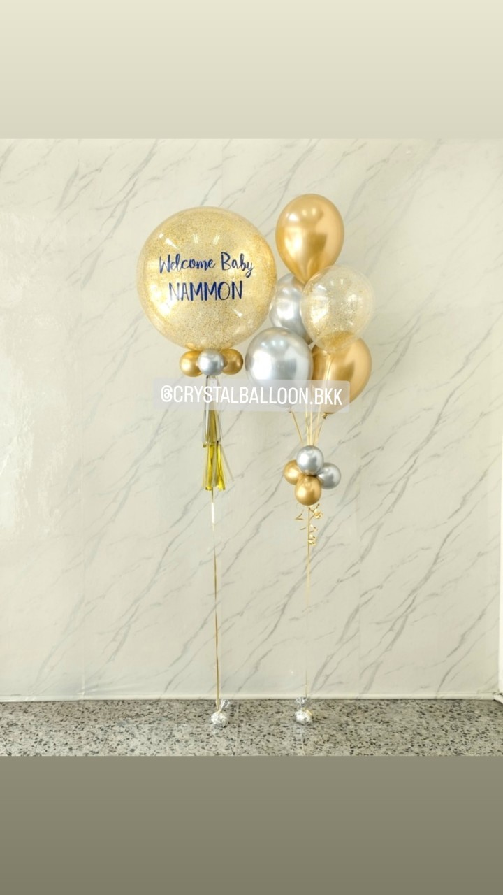 ลูกโป่ง Welcome Baby Bubble ขนาด 24" กลิตเตอร์สีทอง 1 ลูก พร้อม ช่อลูกโป่งสีโครเมี่ยม ช่อ 5 ลูก 1 ช่อ พร้อมตกแต่ง สามารถเปลี่ยนสีลูกโป่ง/เปลี่ยนข้อความ/เปลี่ยนขนาดได้