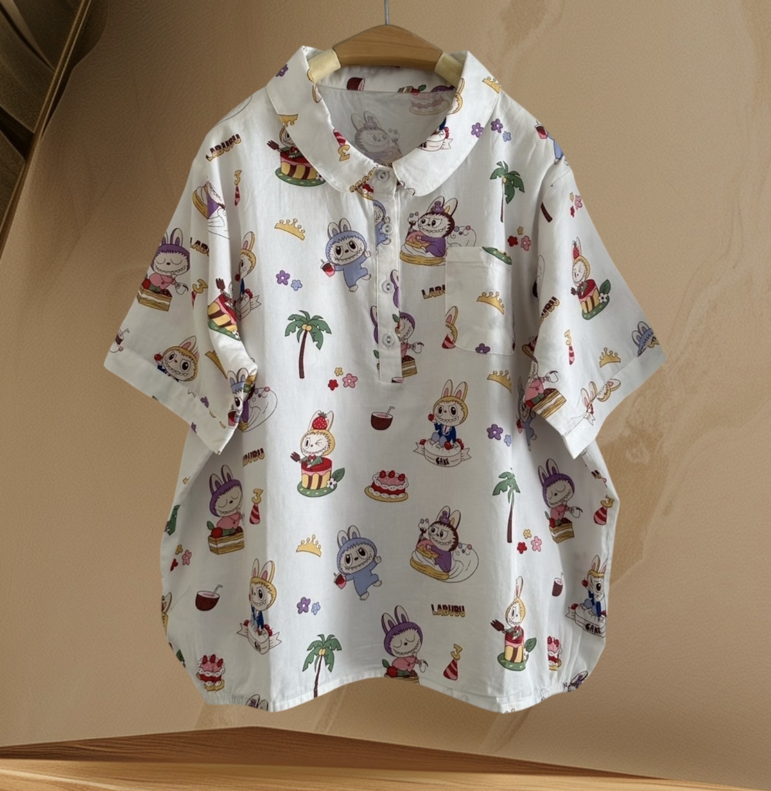 เสื้อผ้าฝ้ายลายพิมพ์แต่งกระเป๋า
