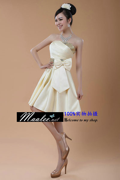 พร้อมเช่า ชุดราตรีสั้น เกาะอก สีครีม Champagne ปักเลื่อมหน้าอก และแถบคาดเอว จับจีบกระโปรง แต่งโบว์ช่วงเอว