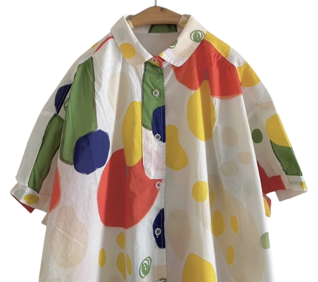 เสื้อผ้าฝ้ายพิมพ์ลายสีสดใส