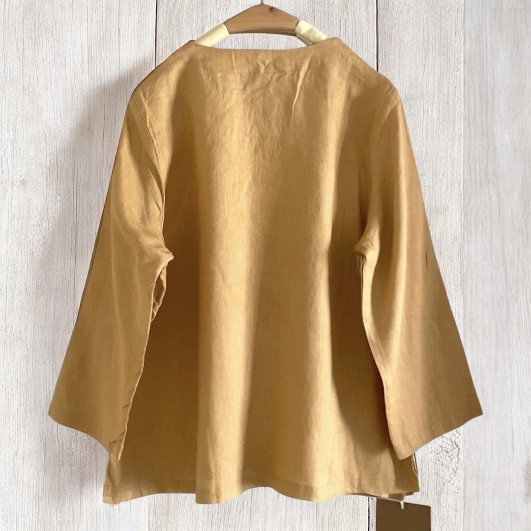 เสื้อผ้าลินินลายปักแต่งกระดุมปม