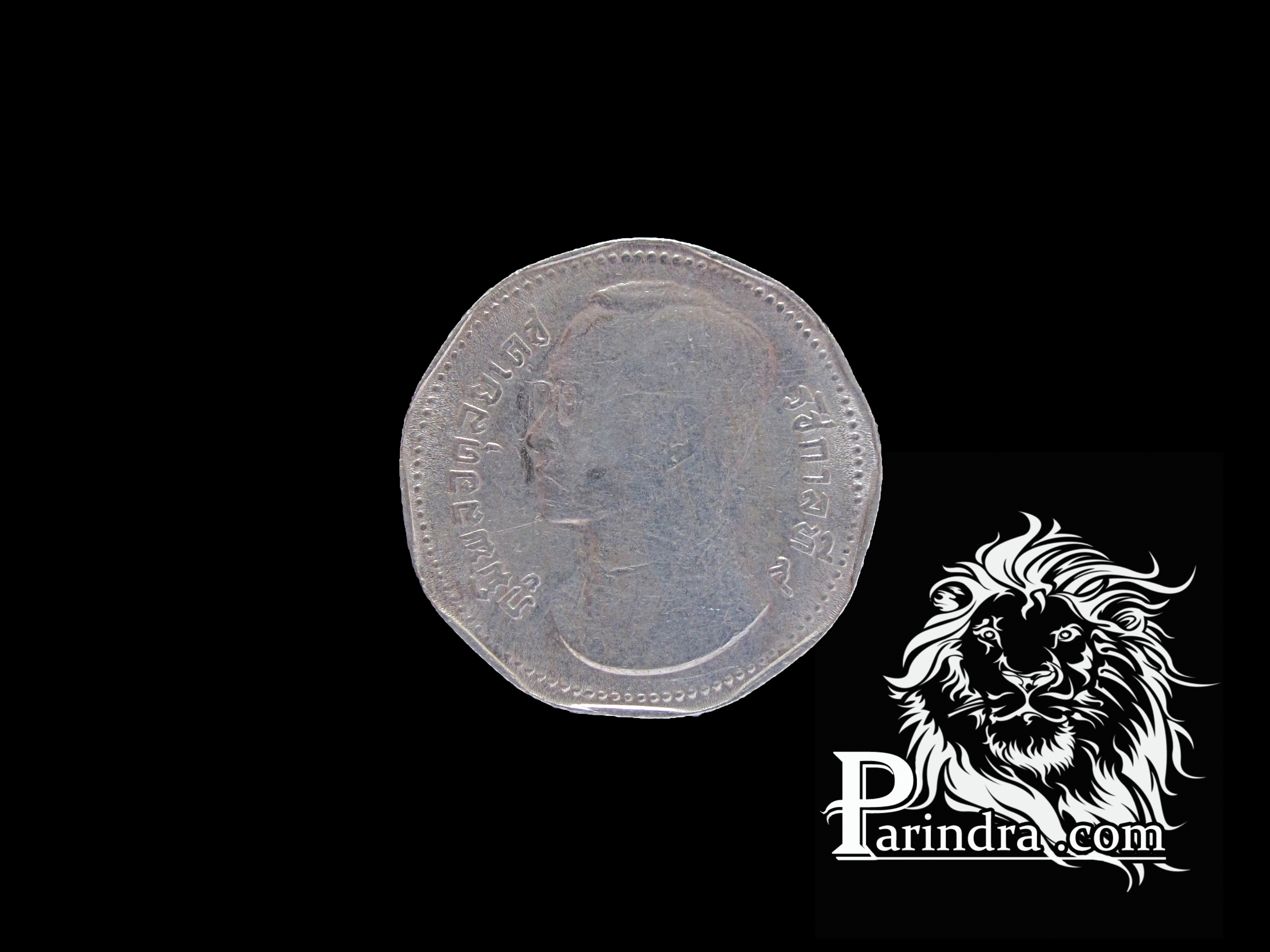 เหรียญกษาปณ์ 9 เหลี่ยมตราครุฑพ่าห์ พ.ศ.2515 ราคา 5 บาท (7)