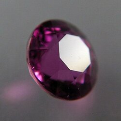 ซองเจีย(Songea Sapphire) ซองเจีย เป็นพลอย ดิบ unheated แดงชมพู อม-ม่วง พลอยเนื้อแข็งมีความสวยงาม ขนาดพลอย 5.89x3.98mm. นน.1.17ct.. ราคาโทรถาม