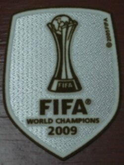 อาร์มสัญลักษณ์ฟุตบอล การแข่งขันฟุตบอลฟีฟ่า คลับ เวิลด์ แชมป์เปี้ยนชิป (ชิงแชมป์สโมสรโลก) - FIFA CLUB WORLD CHAMPIONSHIP CHAMPIONS 2009 PLAYER SIZE ใหม่ / FIFA CLUB WORLD CHAMPIONSHIP International Football Club Tournament PLAYER SIZE Football Patch/Badge
