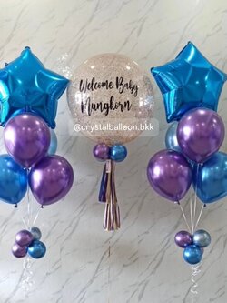 ลูกโป่ง Welcome Baby Bubble ขนาด 24" กลิตเตอร์สีแชมเปญ 1 ลูก พร้อม ช่อลูกโป่งฟอยล์ดาว ขนาด 24" ช่อ 5 ลูก 2 ช่อ Theme น้ำเงินโครเมี่ยม-ม่วงโครเมี่ยม พร้อมตกแต่ง สามารถเปลี่ยนสีลูกโป่ง/เปลี่ยนข้อความ/เปลี่ยนขนาด/เปลี่ยนฟอยล์ตกแต่งได้