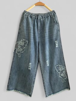 กางเกงยีนส์ลายปักผีเสื้อ