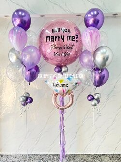 ลูกโป่ง Will You Marry Me? Bubble ขนาด 36" สีชมพู พร้อม ช่อลูกโป่ง 7 ลูก 2 ช่อ,ลูกโป่งใส ใส่กลิตเตอร์,ลูกโป่งลายหิน USA 2 ลูก พร้อมตกแต่ง ฟอยล์แหวนเดี่ยว 1 ชิ้น สามารถเปลี่ยนสีลูกโป่ง/เปลี่ยนข้อความ/เปลี่ยนขนาด/เปลี่ยนฟอยล์ตกแต่งได้