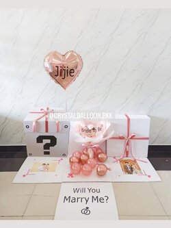 Surprise Box Will You Marry Me? กล่องเซอร์ไพรส์ขอแต่งงาน ลูกโป่งฟอยล์หัวใจ ขนาด 18" สีโรสโกลด์ 1 ชิ้น พร้อม ช่อดอกไม้กุหลาบ 1 ดอก สามารถใส่รูปได้ 2 ใบ สามารถเปลี่ยนสีลูกโป่ง/เปลี่ยนข้อความได้
