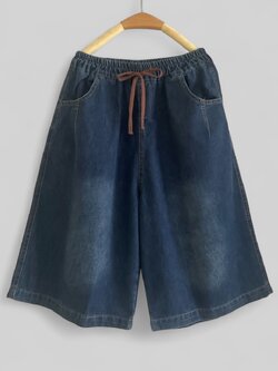 กางเกงยีนส์ขาสามส่วนลายพิมพ์มิ้กกี้ด้านหลัง