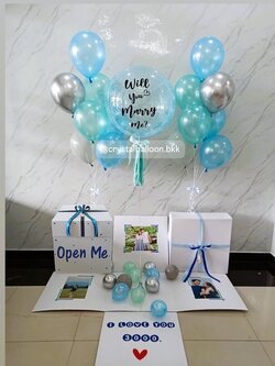 Will you marry me Surprise Box กล่องเซอร์ไพรส์ขอแต่งงาน Bubble ขนาด 24" กลิตเตอร์สีฟ้ามุก ,ลูกโป่งช่อ 7 ลูก 2 ช่อ ,พร้อมตกแต่ง สามารถใส่รูปได้ 4 ใบ สามารถเปลี่ยนสีลูกโป่ง/เปลี่ยนข้อความได้