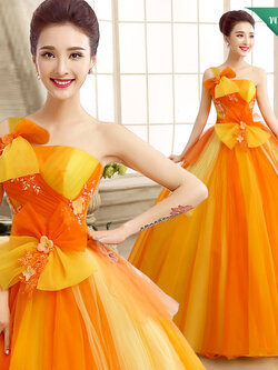 พร้อมเช่า ชุดแฟนซี ชุดราตรี ไหล่เดียว สีส้มแต่งระบายสีเหลือง น่ารัก แต่งโบว์เพิ่มความหวาน