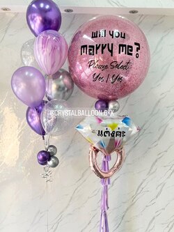 ลูกโป่ง Will You Marry Me? Bubble ขนาด 36" สีชมพู พร้อมตกแต่ง ช่อลูกโป่ง 7 ลูก 1 ช่อ,ลูกโป่งใส ใส่กลิตเตอร์,ลูกโป่งลายหิน USA 2 ลูก พร้อมตกแต่ง ฟอยล์แหวนเดี่ยว 1 ชิ้น สามารถเปลี่ยนสีลูกโป่ง/เปลี่ยนข้อความ/เปลี่ยนขนาด/เปลี่ยนฟอยล์ตกแต่งได้
