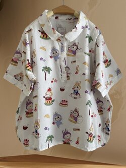 เสื้อผ้าฝ้ายลายพิมพ์แต่งกระเป๋า