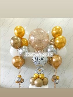ลูกโป่ง ขอแต่งงาน Bubble ขนาด 24" กลิตเตอร์สีแชมเปญ 1 ลูก พร้อม ช่อลูกโป่งสีโครเมี่ยม ช่อ 7 ลูก 2 ช่อ,ฟอยล์แหวนเดี่ยว ตั้งฐาน 1 ชิ้น พร้อมตกแต่ง สามารถเปลี่ยนสีลูกโป่ง/เปลี่ยนข้อความ/เปลี่ยนฟอยล์ตกแต่ง/เปลี่ยนขนาดได้