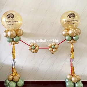 เสาลูกโป่ง เปิดงาน Bubble ขนาด 24" กลิตเตอร์สีทอง 2 เสา พร้อม ริบบิ้นตัดงาน 1 ท่าน พร้อมตกแต่ง สามารถเปลี่ยนสีลูกโป่ง/เปลี่ยนข้อความ/เปลี่ยนสี-ฟอยล์ตกแต่งได้