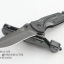 มีดพับ Benchmade ตัวเปิดเร็ว ลายด้ามสีเทา ผสมเคฟล่า ( DA31 )