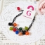 Aznavour สร้อยข้อมือเซลลูโลสจี้ทรงกลมลูกกวาดหลากสี ( Black )
