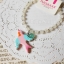 Aznavour & GraindeBeaute สร้อยข้อมือเซลลูโลสจี้นกแต่งคริสตัล Swarovski (clear)