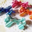 BoBo Collection กิ๊บติดผมโบว์ลายเส้นน่ารัก (ส้ม)