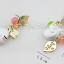 Nuance Korea ต่างหู ตุ้มหูเกาหลีหอยทากน้อยน่ารักแต่งใบไม้หินสีส้ม - ทอง