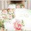 Pre-order กี่เพ้า สีขาวเขียว ลายดอกไม้ ผ่าข้าง กุ๊นขอบอย่างดี