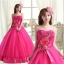 พร้อมเช่า ชุดแฟนซี ชุดราตรี เกาะอก สีชมพู Hot pink แต่งช่อดอกไม้ช่วงหน้าอก